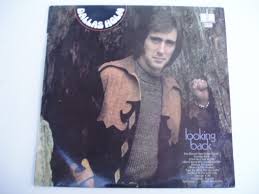 Portada del álbum Looking Back de Dallas Holm